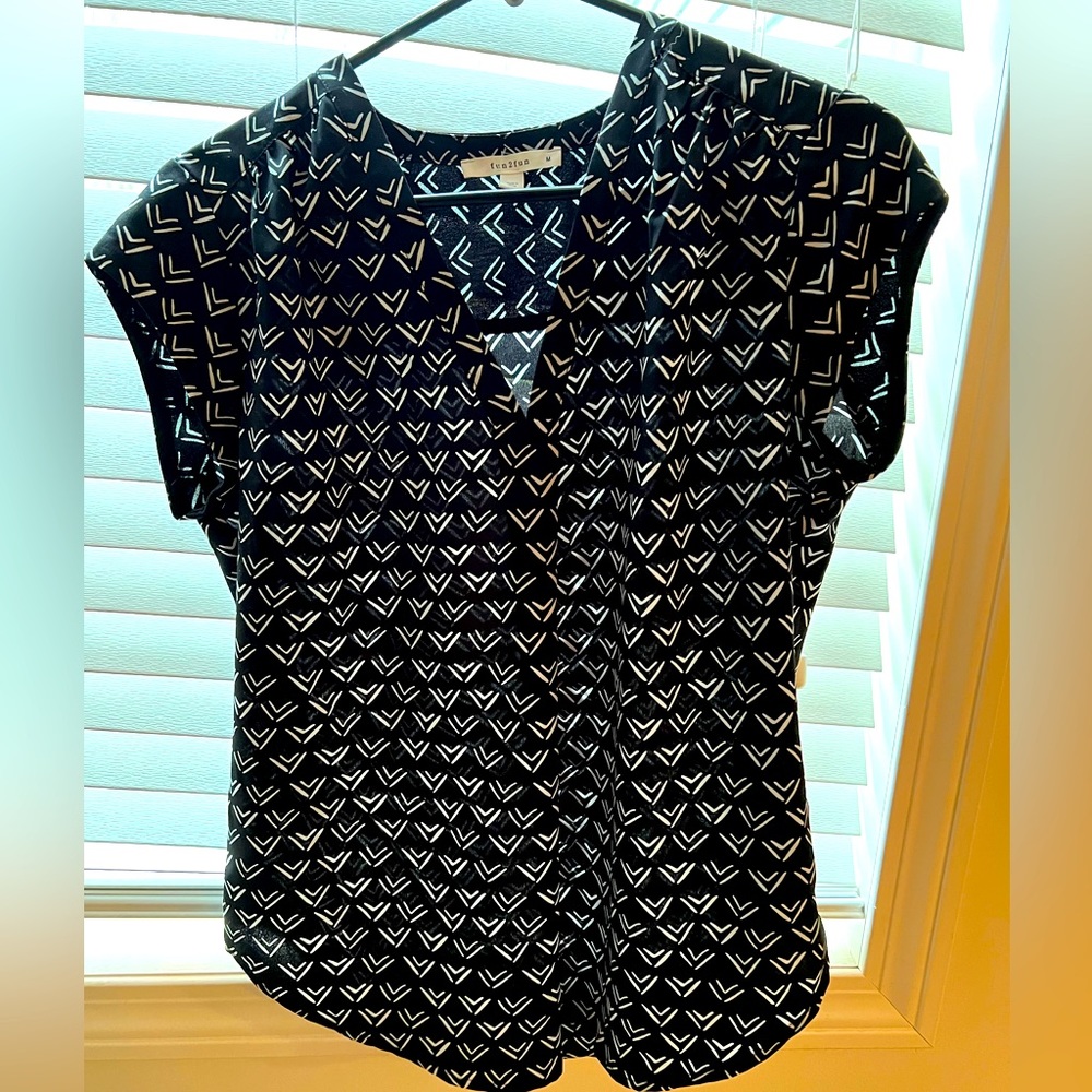 Women’s blouse. New condition